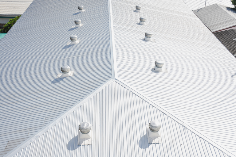 One of the industrial roofing services featuring multiple vents, showcasing Mr. Max Roofing's expertise