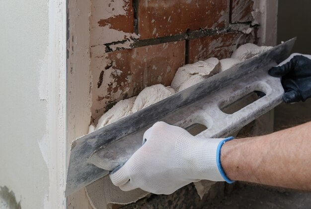 worker is putting gypsum plaste 191163 677